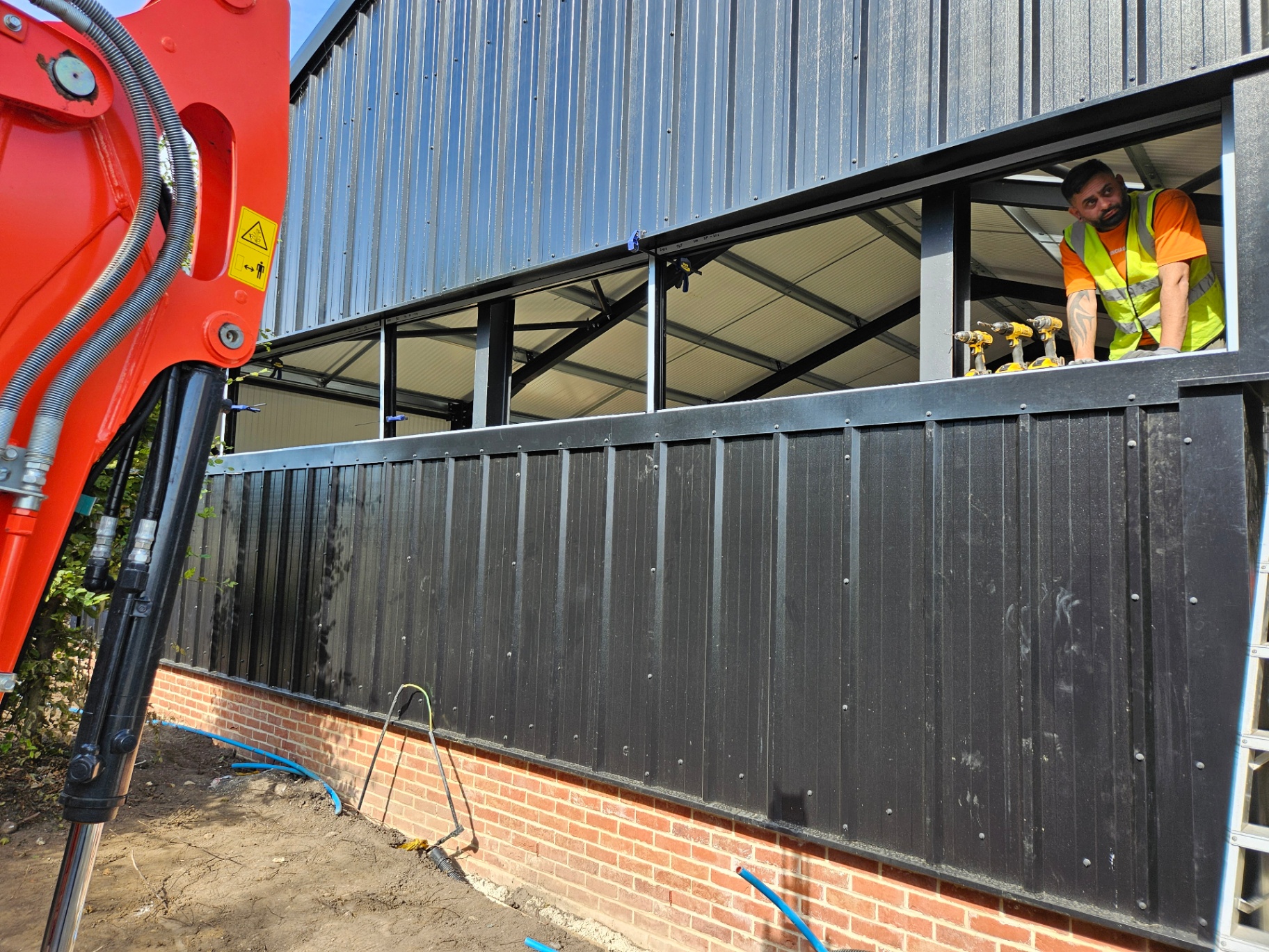 Algy's Norwich — aluminium curtain wall, shopfront and roller shutter installation – Prestige Aluminium Systems