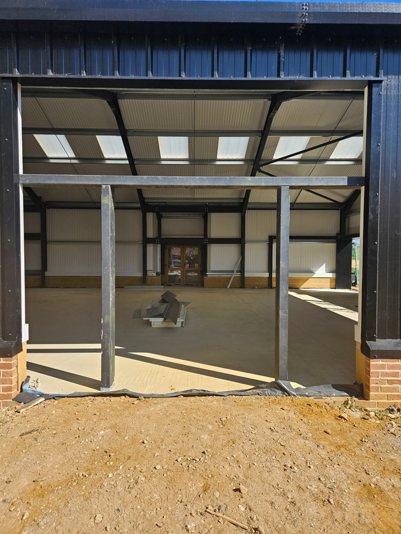 Algy's Norwich — aluminium curtain wall, shopfront and roller shutter installation – Prestige Aluminium Systems