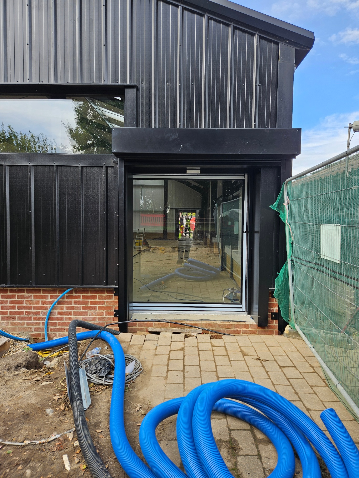 Algy's Norwich — aluminium curtain wall, shopfront and roller shutter installation – Prestige Aluminium Systems