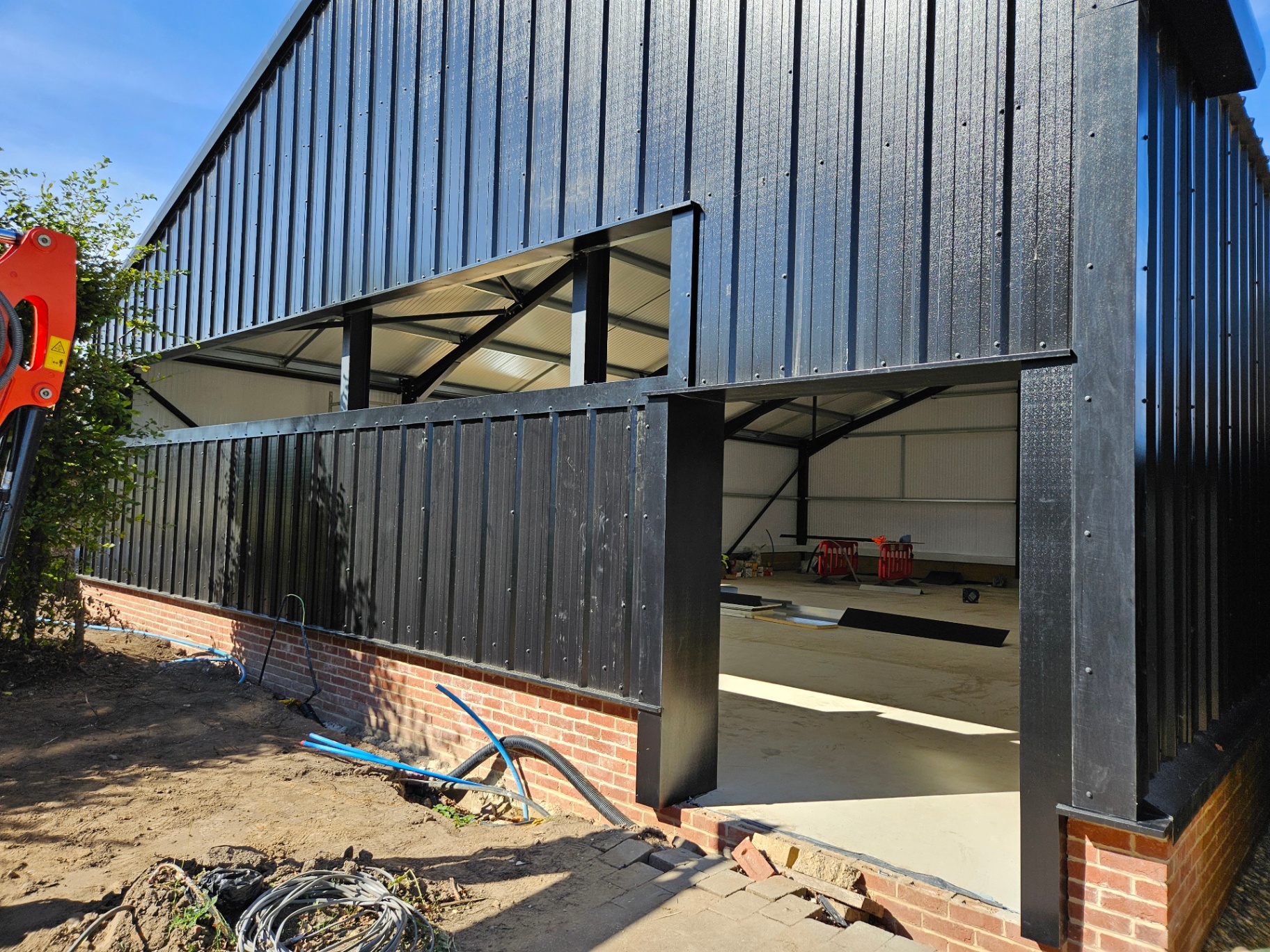Algy's Norwich — aluminium curtain wall, shopfront and roller shutter installation – Prestige Aluminium Systems