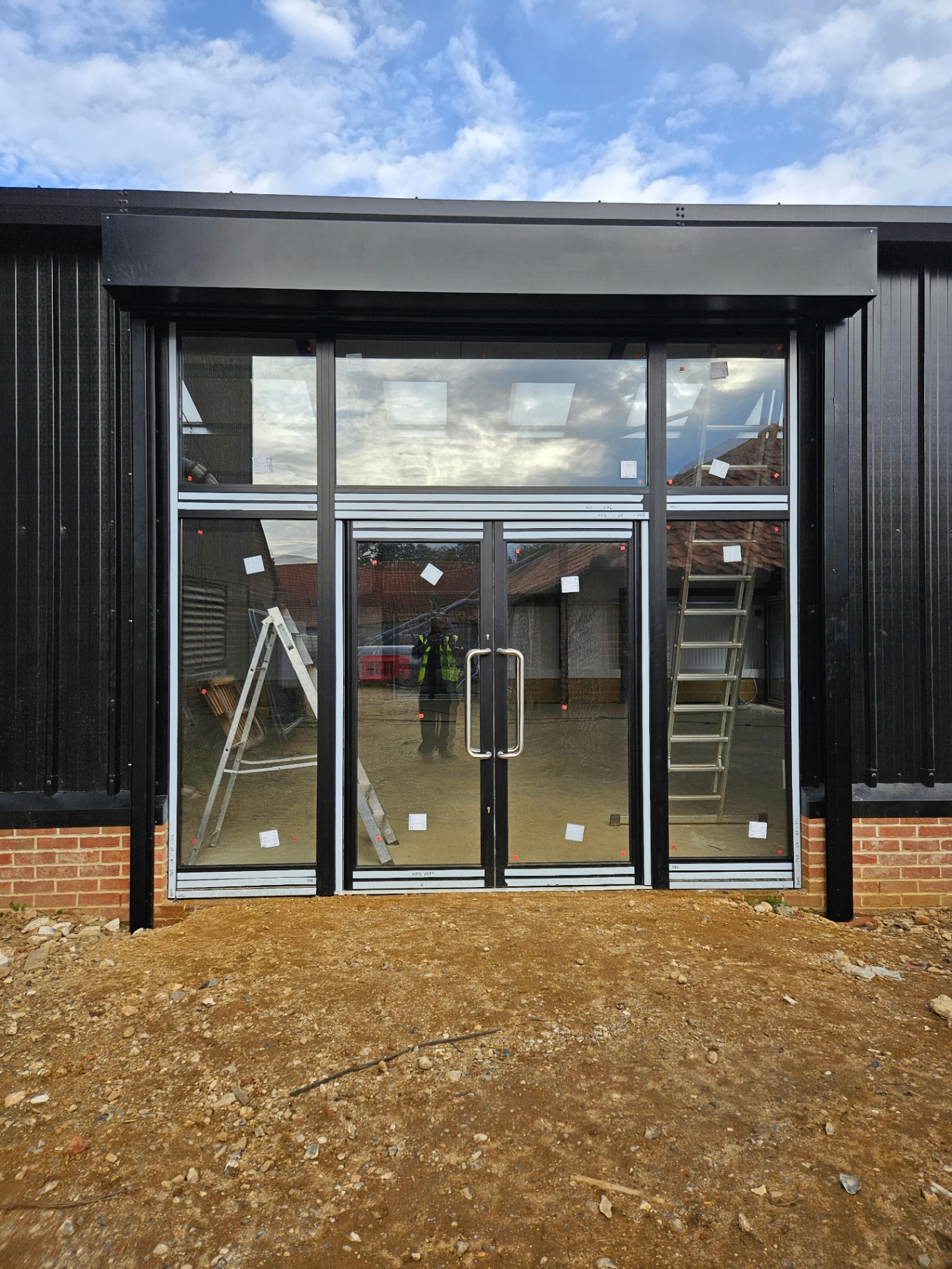 Aluminium shopfront with double doors – Prestige Aluminium Systems