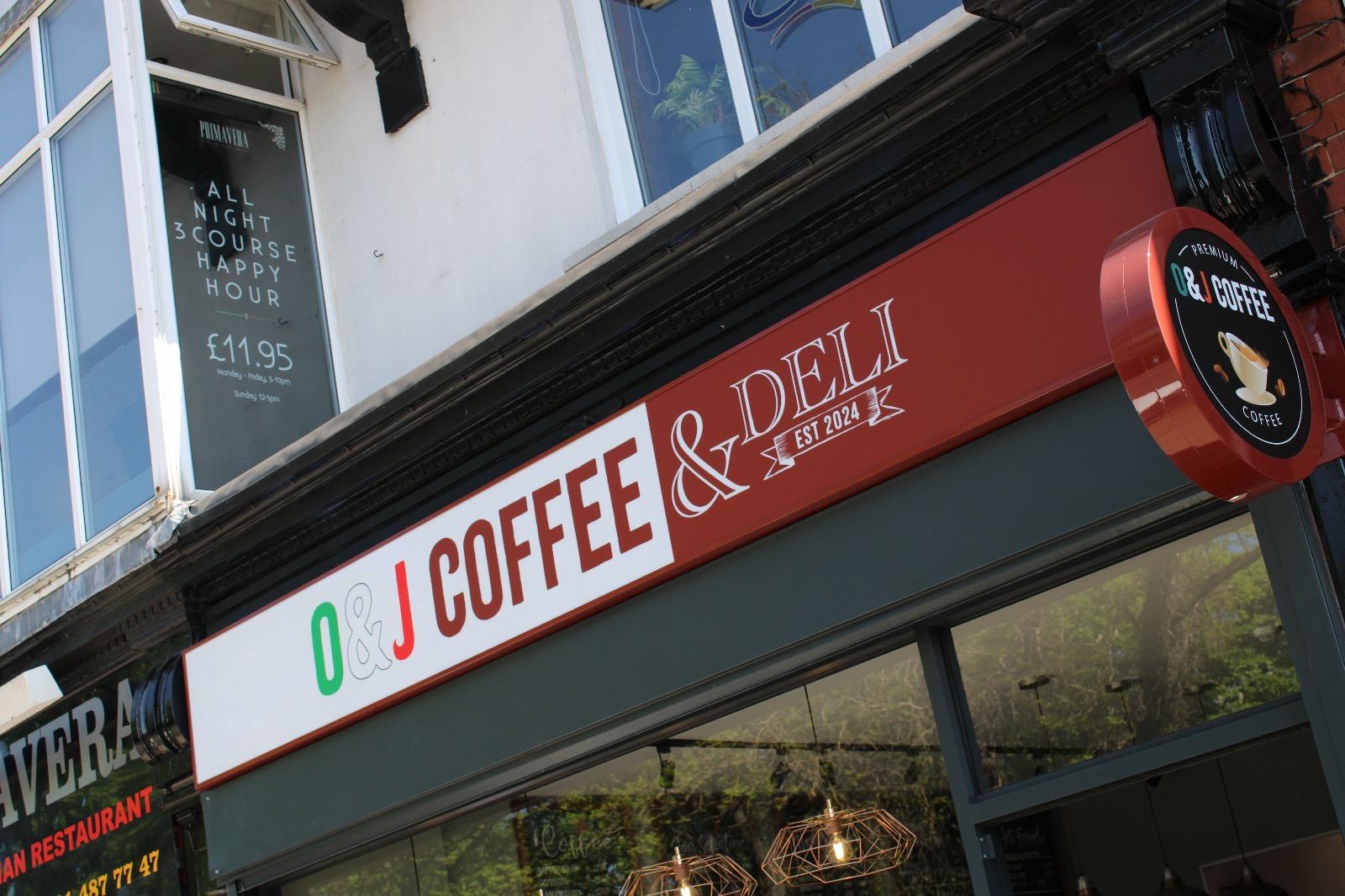 OJ Coffee Newcastle — aluminium shopfront and double door installation – Prestige Aluminium Systems