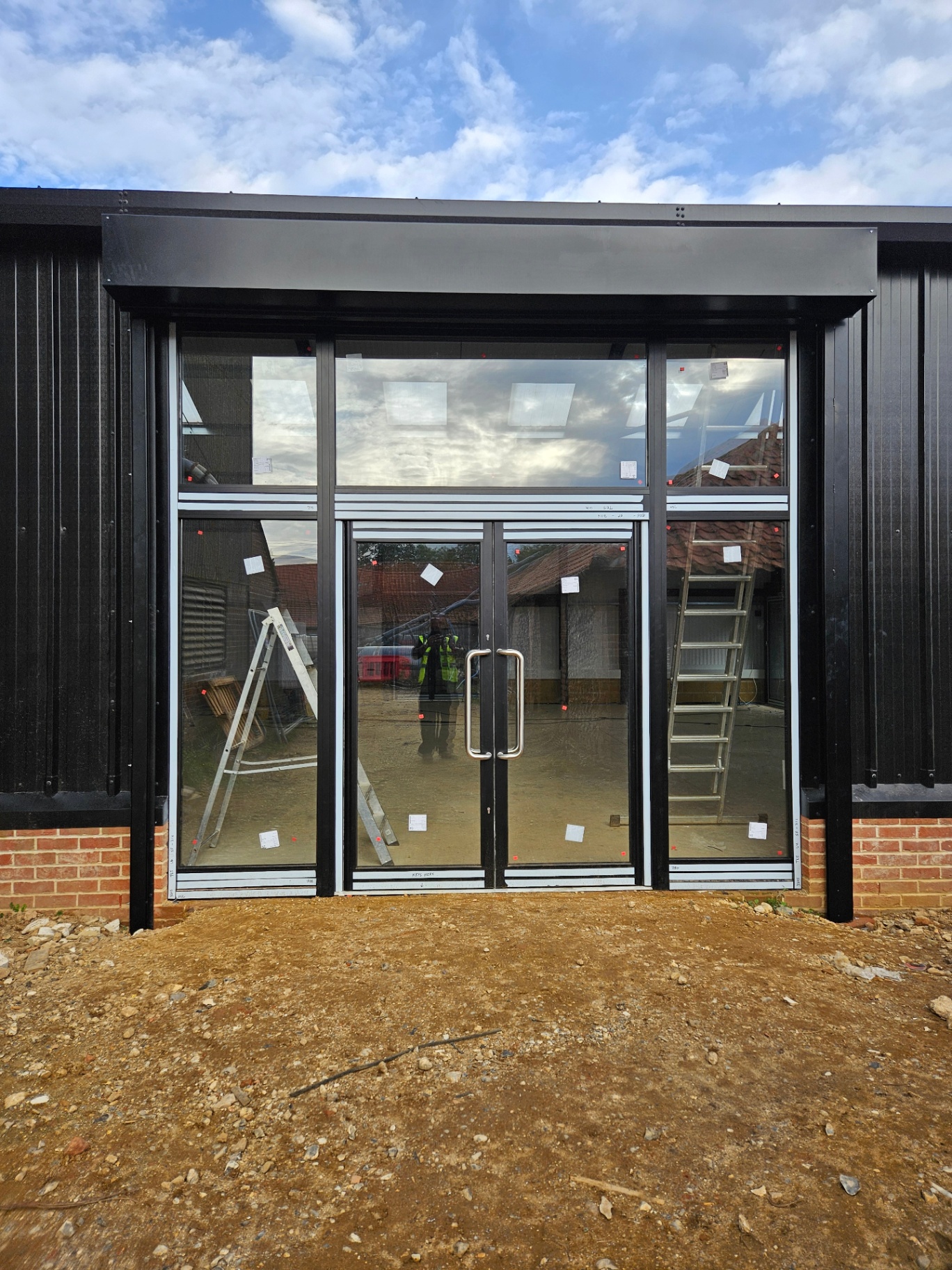 Algy's Norwich — aluminium curtain wall, shopfront and roller shutter installation – Prestige Aluminium Systems